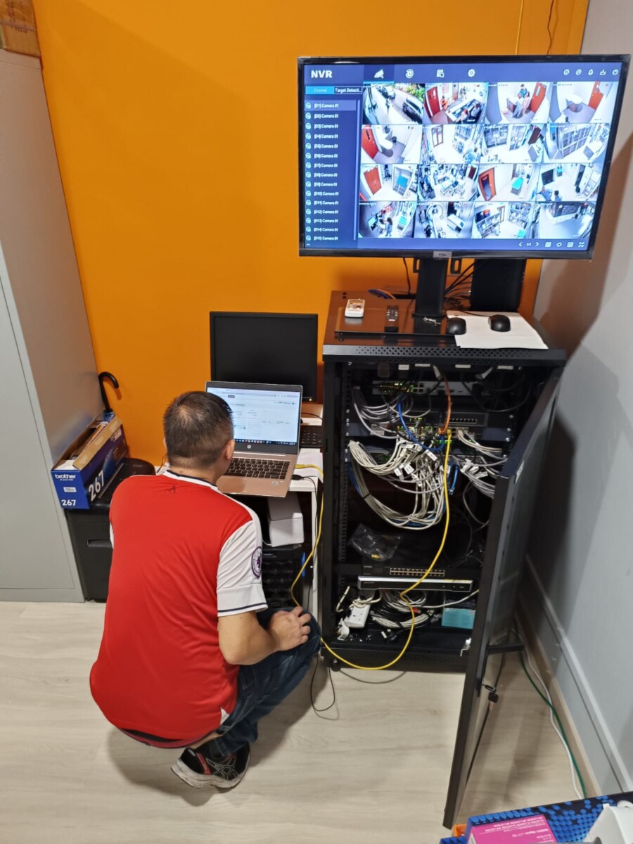 Engineer performing CCTV configuration and troubleshooting in Singapore